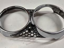LEFT HAND HEADLIGHT TRIM 124 BC